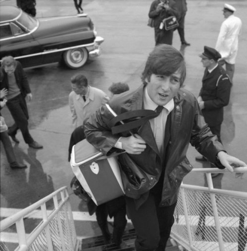John Lennon boards a Viscount aircraft for a domestic flight at Wellington Airport, June 23, 1964. The capital's airport did not have jet bridges for domestic flights until the late-'80s, so you were invariably guaranteed a soggy boarding